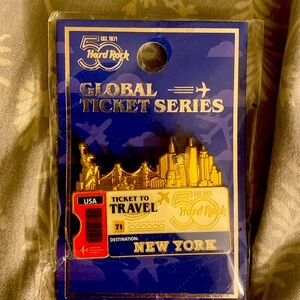 Brand new in packaging. Hard Rock Cafe Global Ticket Series Pin
